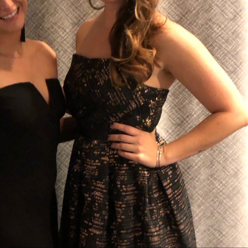 Strapless black and gold evening gown